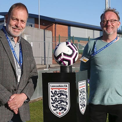 Dave and Pete next to Lancashire FA football stand