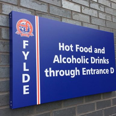 AFC Fylde - ali-comp wayfinding sign tray wrapped in digitally printed vinyl.