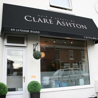 Clare Ashton hair salon - wedge awnings with printed text brushed aluminium stand off letters.