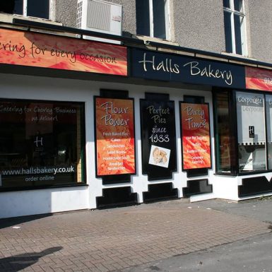 Halls Bakery shop - with digitally printed fascia framed panel sign and trough lights.