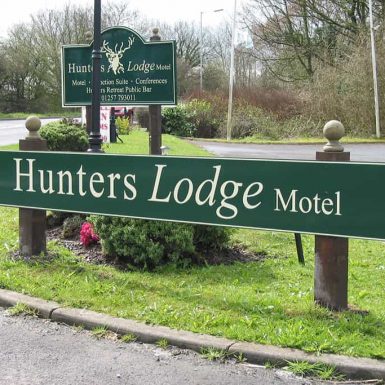 Hunters Lodge Motel - flat panel directional sign with digital print.