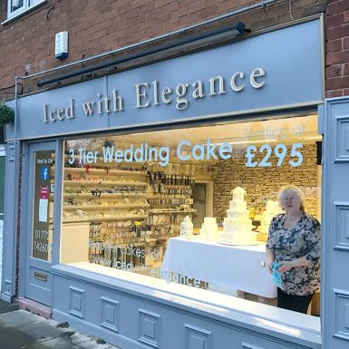 Iced with Elegance bakery shop - sign with stand-off letters.