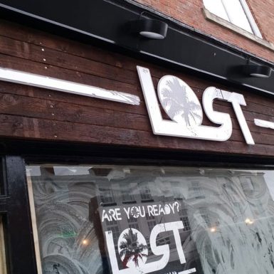 Lost bar shop - sign with white vinyl applied to 5mm acrylic on stand-off locators.