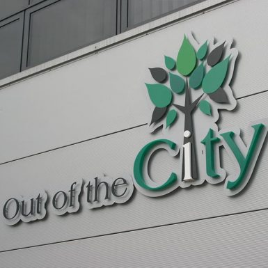 Out of the City - built up flat cut acrylic letters mounted on an aluminium panel