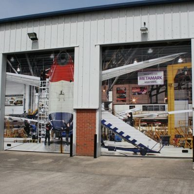 Poppy Signs full colour digitally printed vinyl applied to external shutter doors