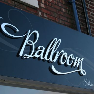 The Ballroom Salon - sign tray with flat cut acrylic letters on stand-off locators.