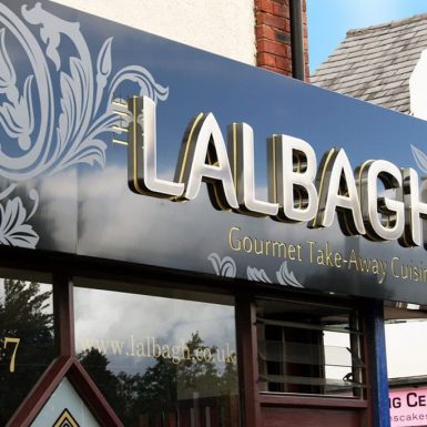 The Lalbagh Take-Away - built-up stainless steel letters with print-to-face fret cut halo and text on a sign tray.