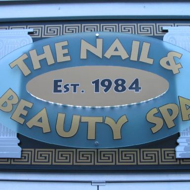 The Nail & Beauty Spa - sign tray with built up letters feature acrylic logo and LED halo illumination.