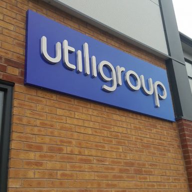 utiligroup - 3D built up stainless steel letters mounted on an aluminium sign tray covered in digital print