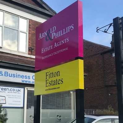 Arnold and Clark Estate Agent - aluminium back-to-back sign trays on aluminium posts