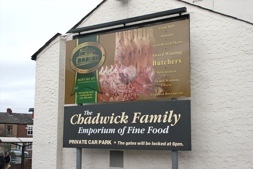 chadwicks-shop-and-restaurant-flat-panel-sign-on-metal-posts-with-trough-light Chadwick's Shop and Restaurant - flat panel sign on metal posts with trough light