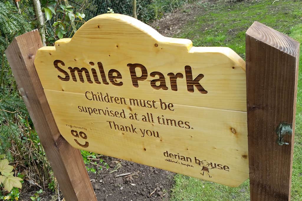 derian-house-smile-park-timber-sign-with-laser-etching Derian House Smile Park - timber sign with laser etching