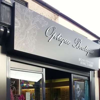 Optique Boutique - sign tray with cut vinyl text and stand-off aluminium letters