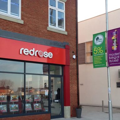 Redrose - lamp pole fitted double sided PVC banners on projecting arms