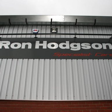 Ron Hodgson - digitally printed graphics on flat panel sign with trough light