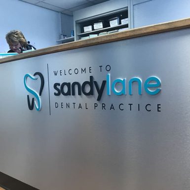 Sandy Lane Dental Practice - laminated graphics with stand-off letters on brushed ali-comp