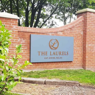 The Laurels - fret cut sign tray with acrylic push through halo illuminated letters with copper vinyl to face