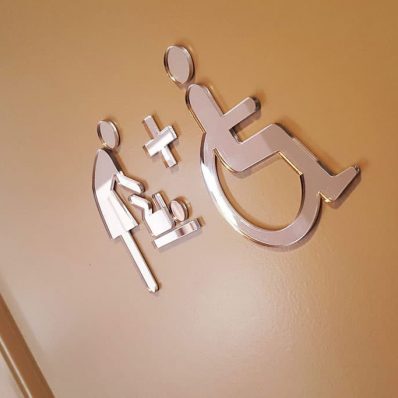 The Laurels - mirror chrome laser cut acrylic letters bonded directly to the door