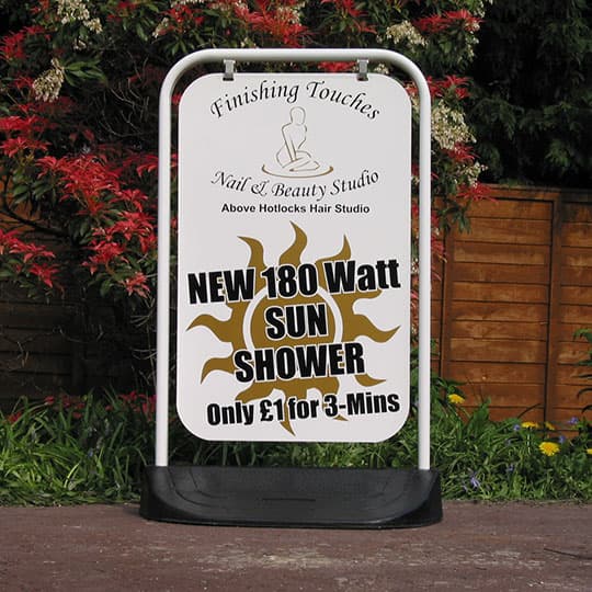 A-board swinger signs banner A-board swinger sign featuring digitally printed graphics by Finishing Touches Studio.