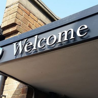 FRS Roofing Services St Bedes - 10mm black acrylic letters with brushed aluminium vinyl-to-face on stand-offs