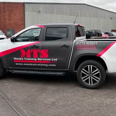 Monks Training Services - full colour protective UV matte laminate part vehicle wrap