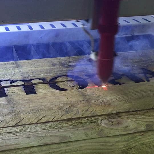 Piranha laser cutter engraving timber - banner