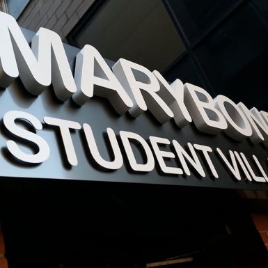 Sanctuary Student Village - 3D built up stainless steel letters powder coated white red