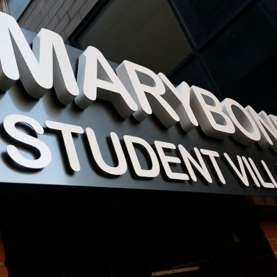 Sanctuary Student Village - 3D built up stainless steel letters powder coated white red