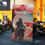 X Banner in motorcycle showroom advertising helmets