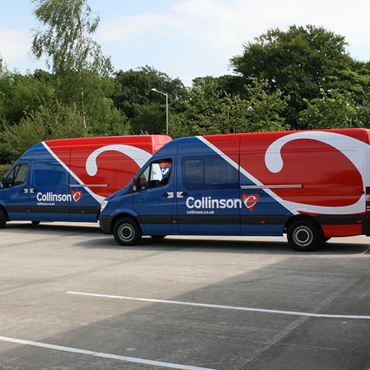 Two vans parked, fleet part wrapped vehicles with cut graphics