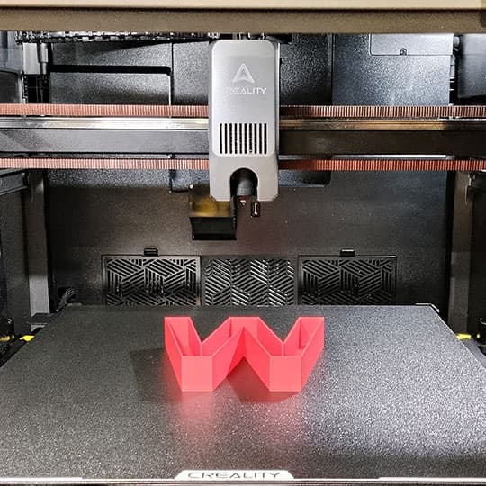 3d-printed-red-pla-letter-w-with-1.5mm-shell-creality-k2-plus 3d printed red pla letter w with 1.5mm shell creality k2 plus