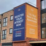 South Liverpool Homes - digitally printed 1x large 3370 x 6380mm mesh building banner using tensioned wire system