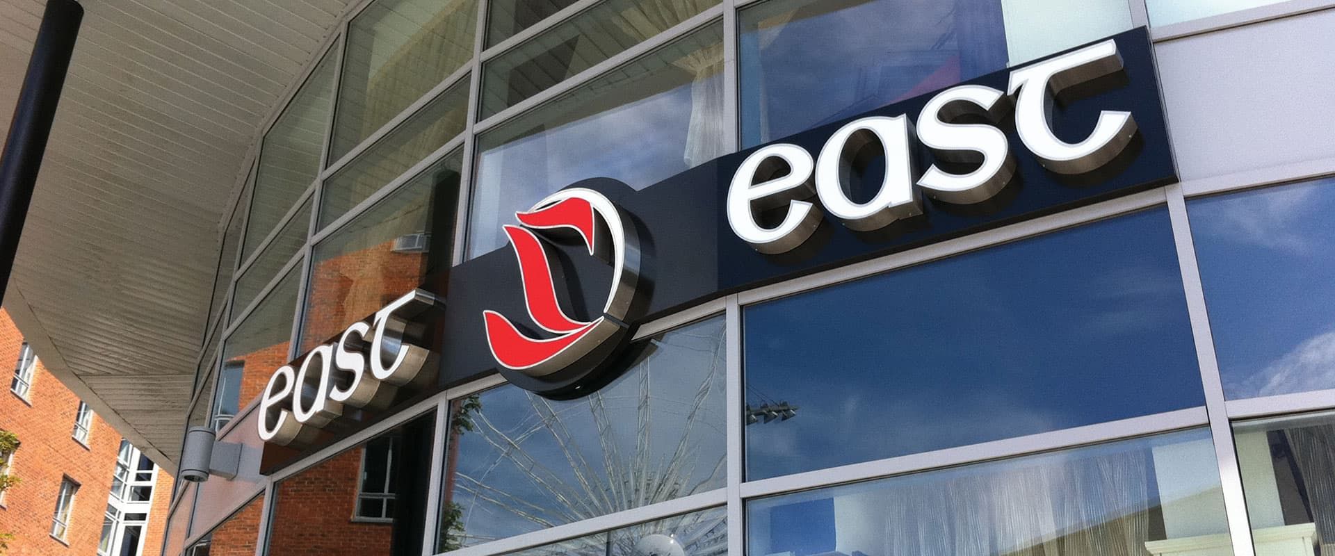 East is East exterior standoff illuminated letters